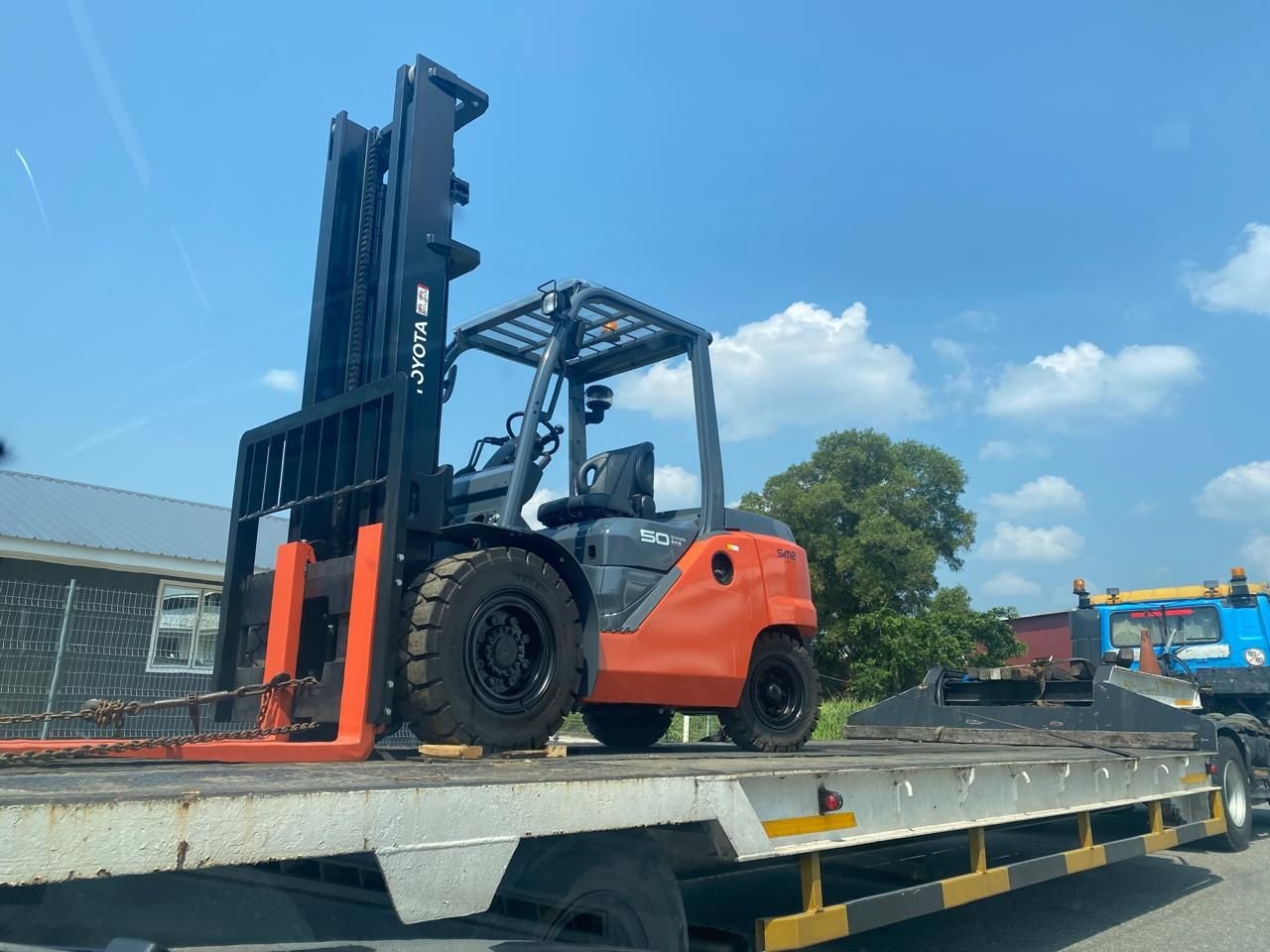 Forklift supplied by RASB loaded on a transport trailer